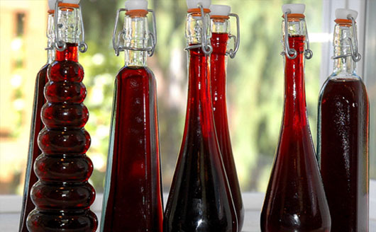 Bottles of berry liqueur