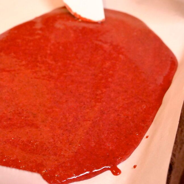 Spreading Purée for Homemade Strawberry-Blueberry Fruit Leather Recipe