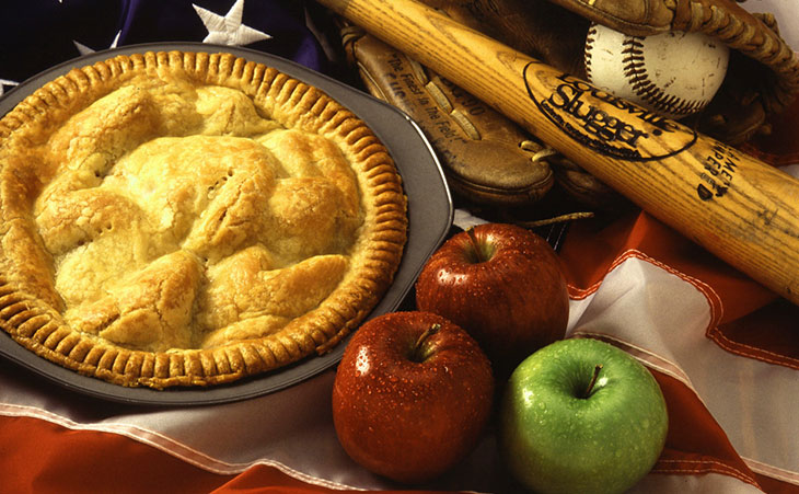 Baked pie with fresh apples along side