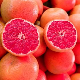 photo of oranges and one cut open