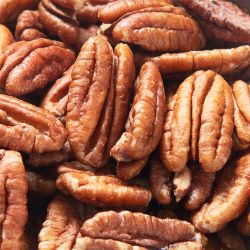 multiple shelled pecans in pile