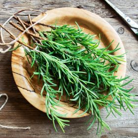 Cut rosemary in a bowl