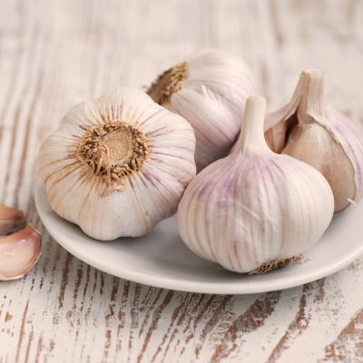 garlic bulbs on plate