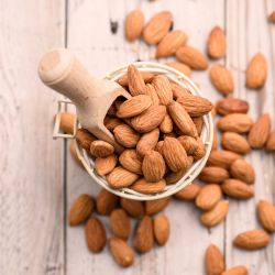 Almonds in a bowl with a scoop