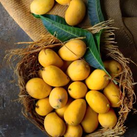 Basket full of ripe mangos