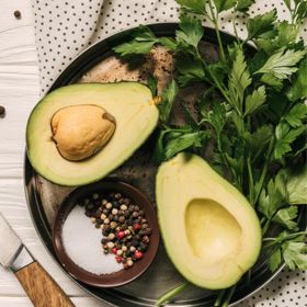 Lula Avocado Cut Open Laying on Plate