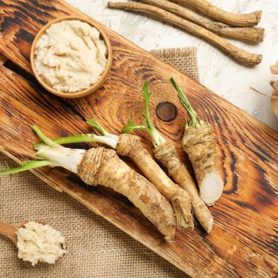 horseradish roots on a cutting board