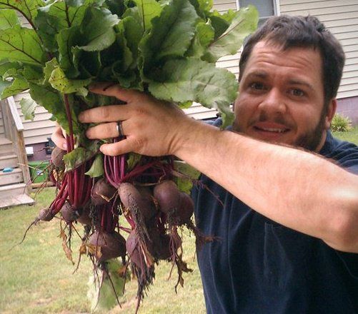 Holding up a bounty of Odom Beets