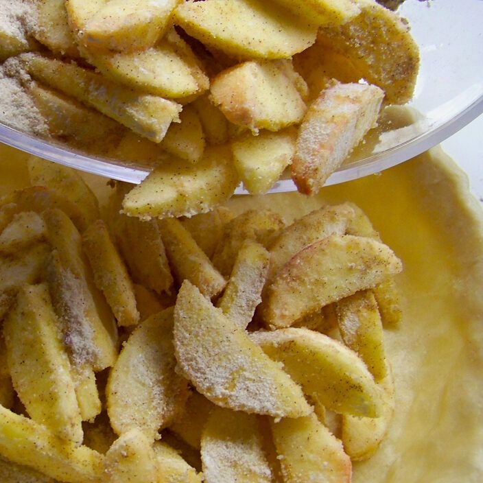 Filling Pie Crust with Apples