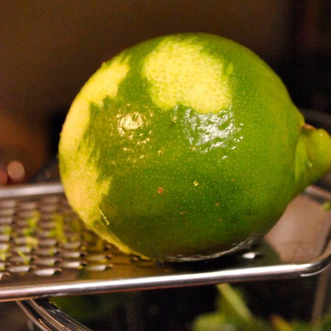 Zesting a Lime for Homemade Strawberry-Blueberry Fruit Leather Recipe