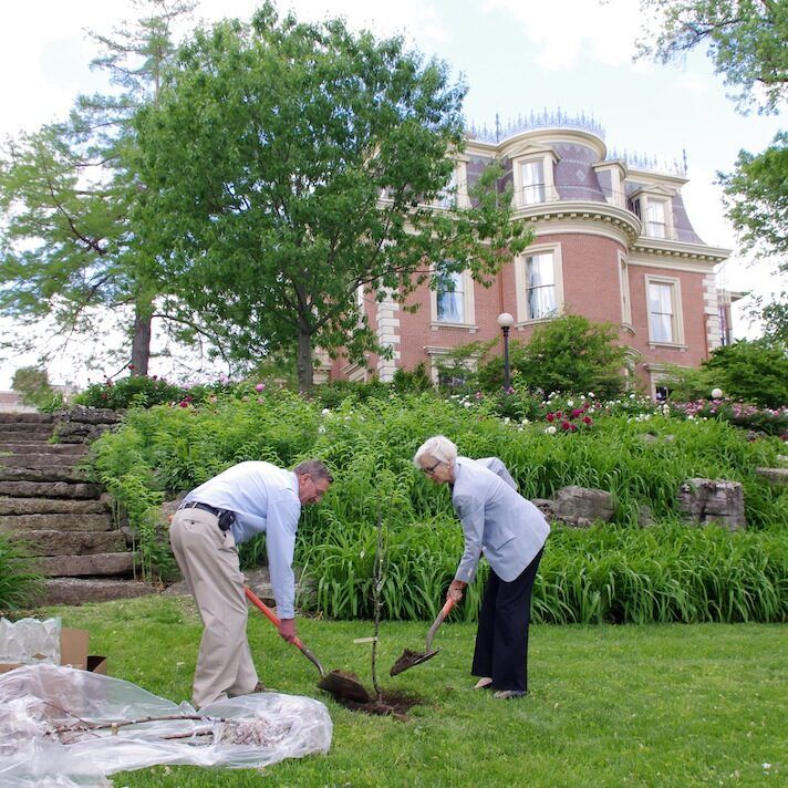 Mrs. Nixon & Elmer Kidd Planting a Tree